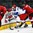 GRAND FORKS, NORTH DAKOTA - APRIL 16: Russia's Mikhail Sergachyov #2 and Switzerland's Dominik Volejnicek #11 battle for the puck during preliminary round action at the 2016 IIHF Ice Hockey U18 World Championship. (Photo by Matt Zambonin/HHOF-IIHF Images)

